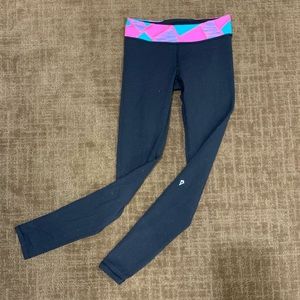 Black Ivivva leggings with colorful waistband